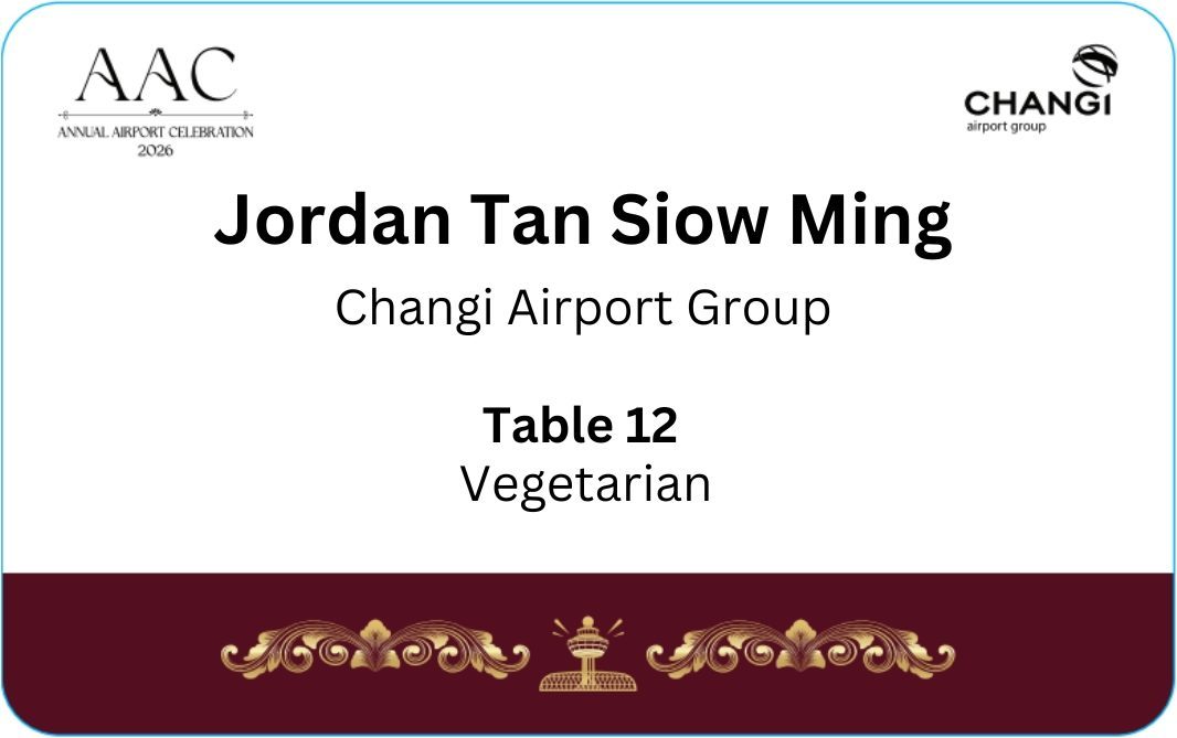 Name card for Jordan Tan Siow Ming, representing Changi Airport Group, seated at Table 12 with a vegetarian meal.